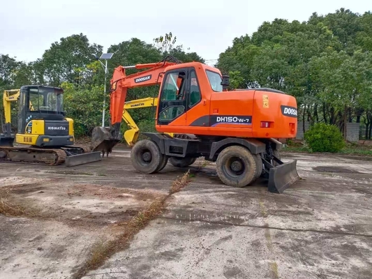 Υψηλή λειτουργική αποδοτικότητα Doosan DH150W-7 Χρησιμοποιούμενος ελκυστήρας εξορυκτής με κινητήρα Ιαπωνίας